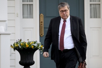 caption: Attorney General William Barr leaves his home in McLean, Va., Friday before the Mueller report on Russian interference and potential Trump campaign collusion was handed over to him.