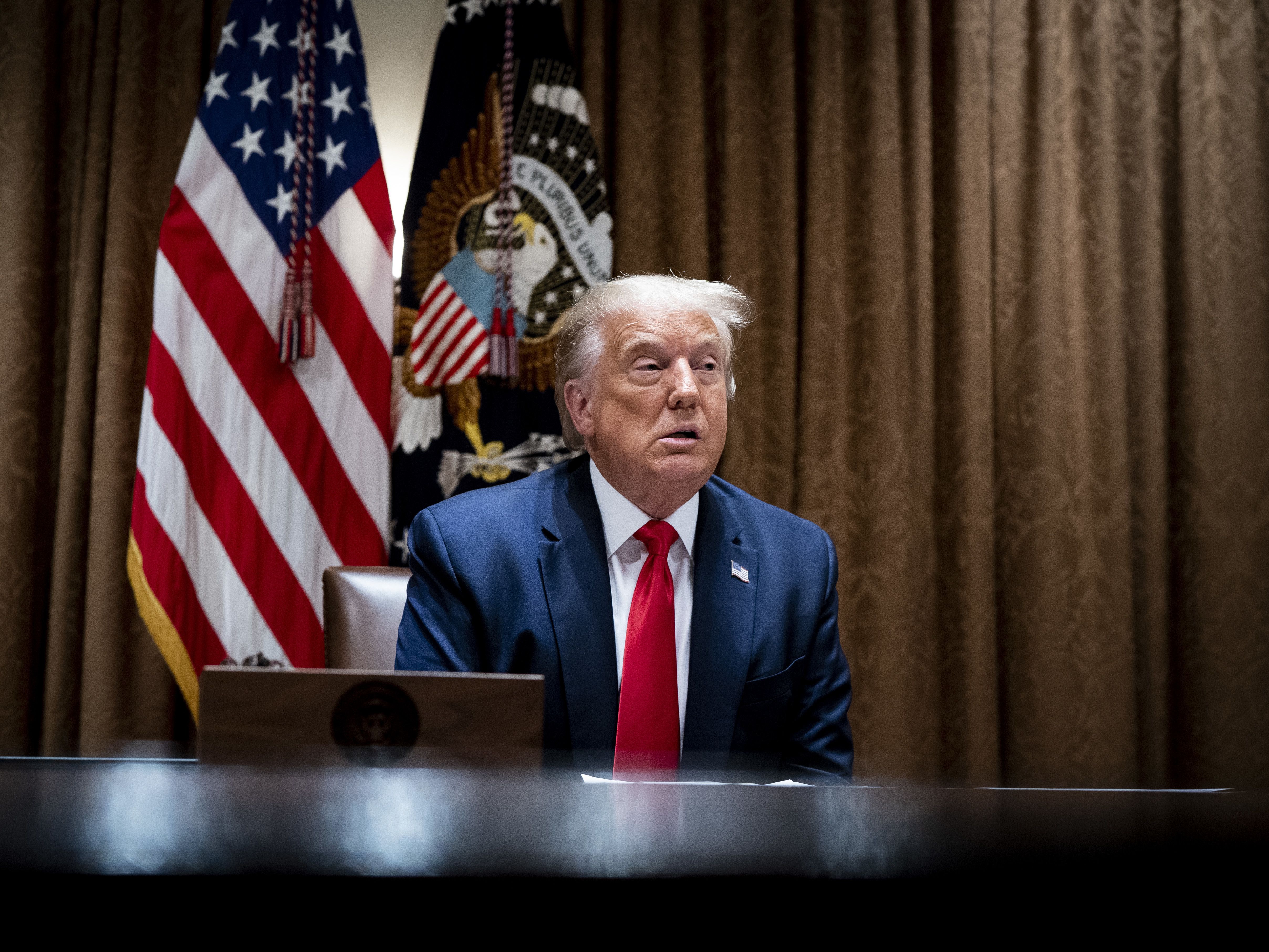 caption: When asked in an interview whether he found the late Rep. John Lewis impressive, President Trump claimed to have done more for Black Americans than anybody else.