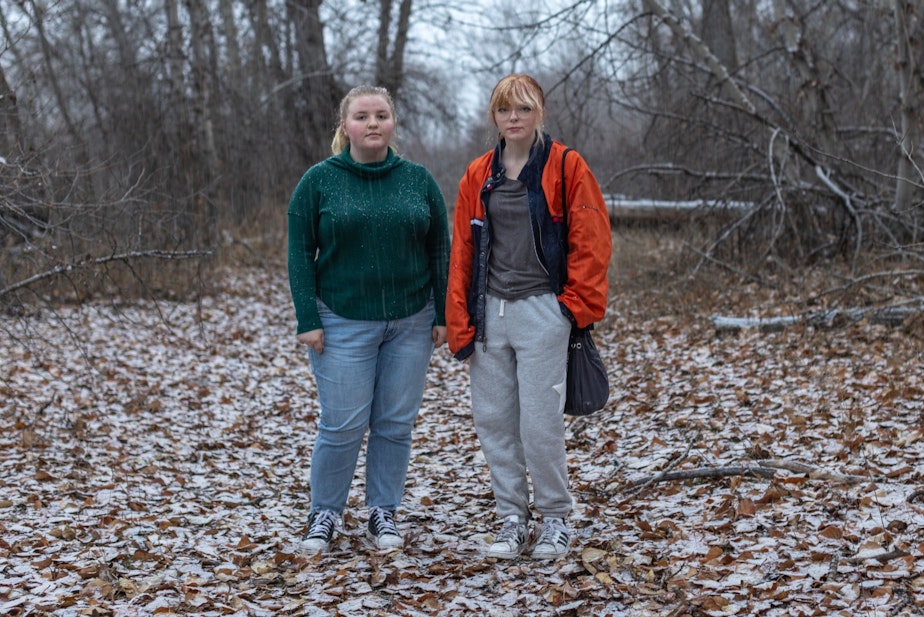 caption: Amythist McCart, left, and Kayla Shelton were close friends of missing Indigenous teenager Kit Nelson-Mora. Kit and McCart often wandered these trails by McCart’s grandma’s home in Yakima, Wash. 