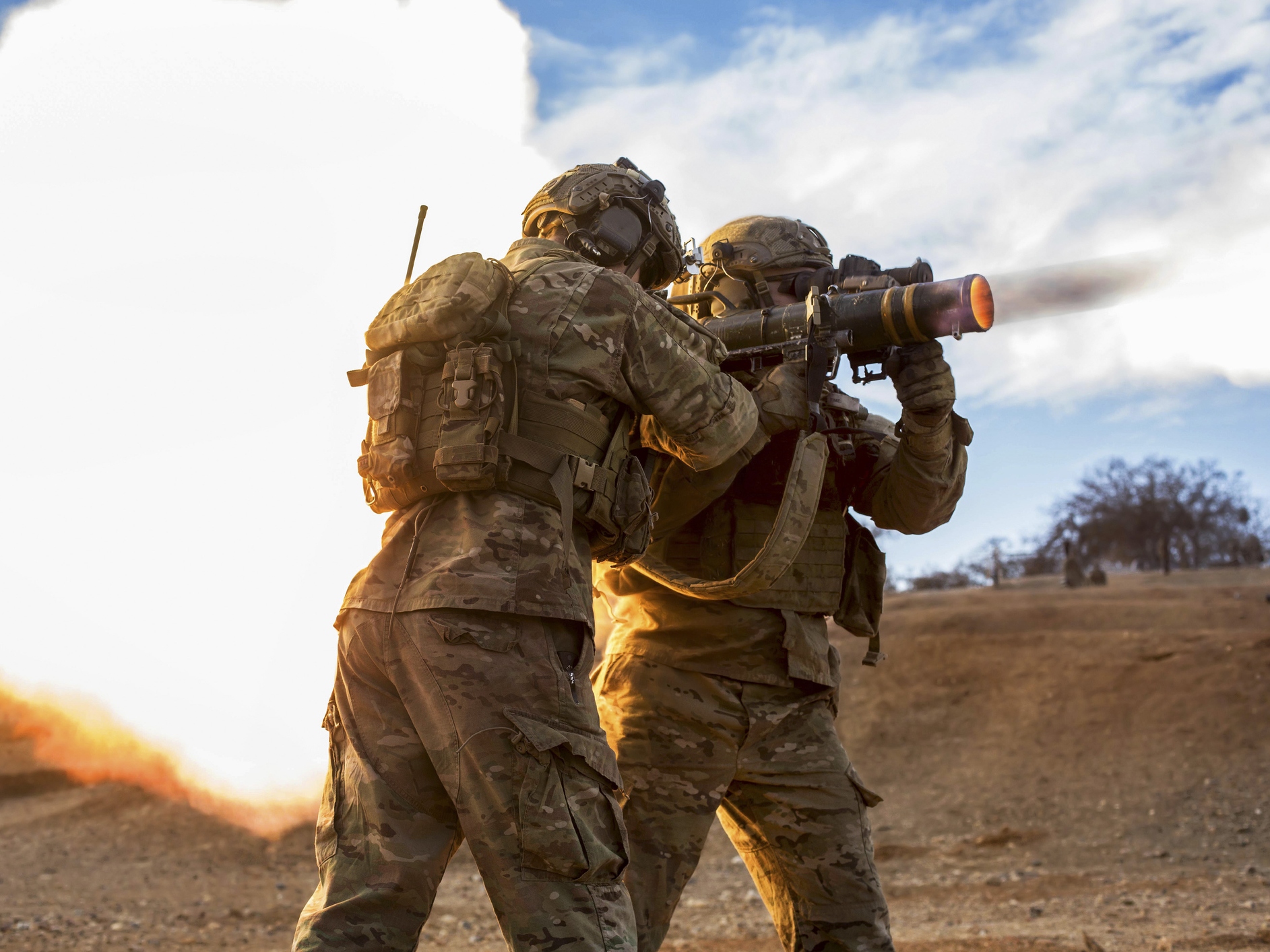 caption: U.S. Army Rangers fire an AT4 at a range on Camp Roberts, California. 