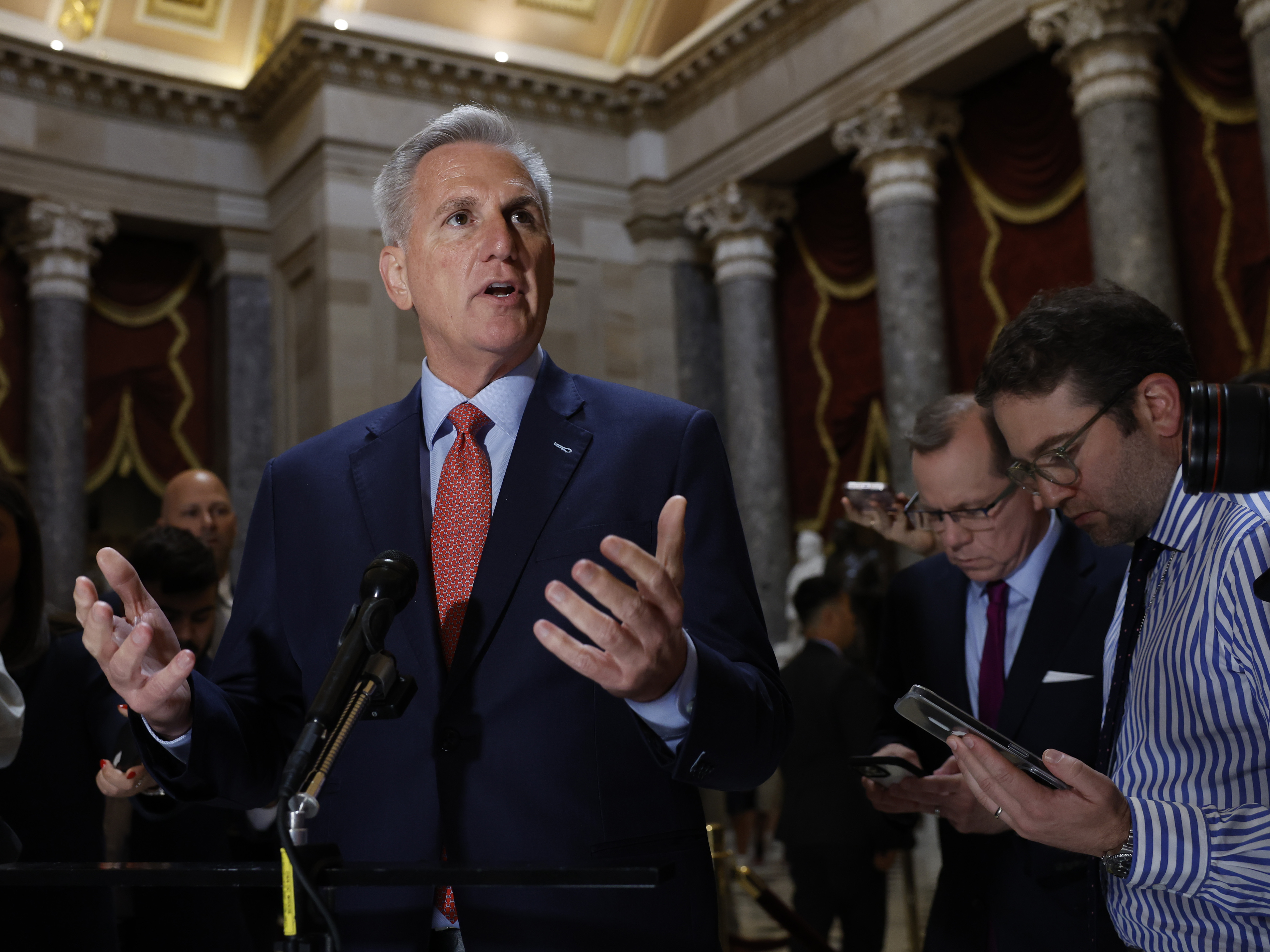 caption: House Speaker Kevin McCarthy speaks to members of the media at the U.S. Capitol in Washington, D.C., on May 24, 2023. The U.S. government will soon run out of cash to pay its bills unless it can raise or suspend its debt ceiling.