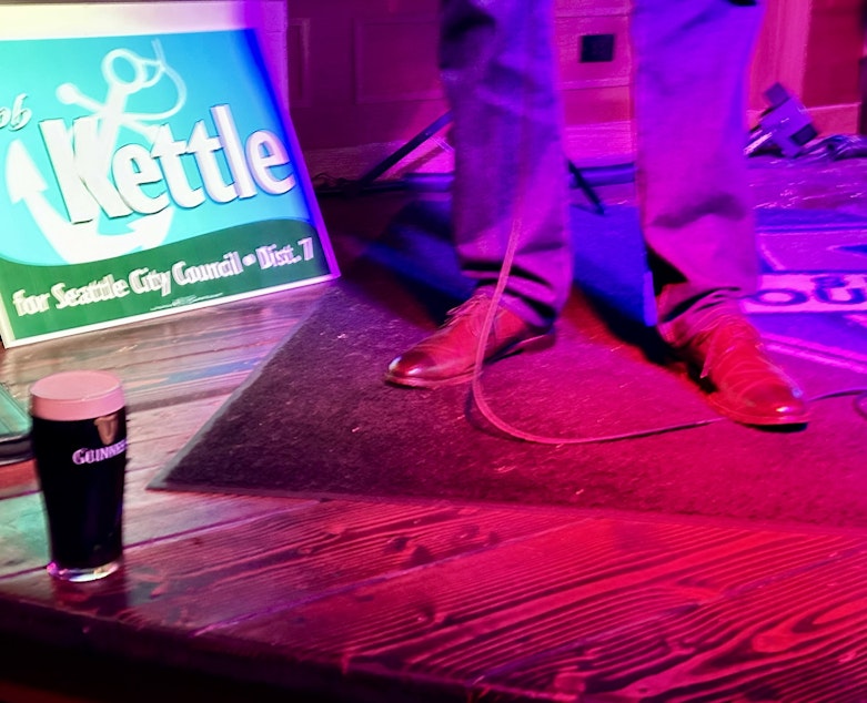 caption: After a night of drinking water at Kell's Pub & Restaurant in downtown Seattle, council candidate Bob Kettle was treated to a pint of Guinness as the first ballots results came in, showing him in a prominent lead.