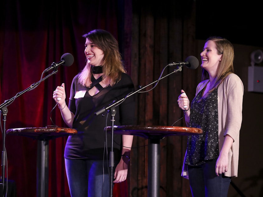caption: Contestants Nicole Lindenbaum and Adrienne Clermont appear on<em> Ask Me Another</em> at the Bell House in Brooklyn, New York.
