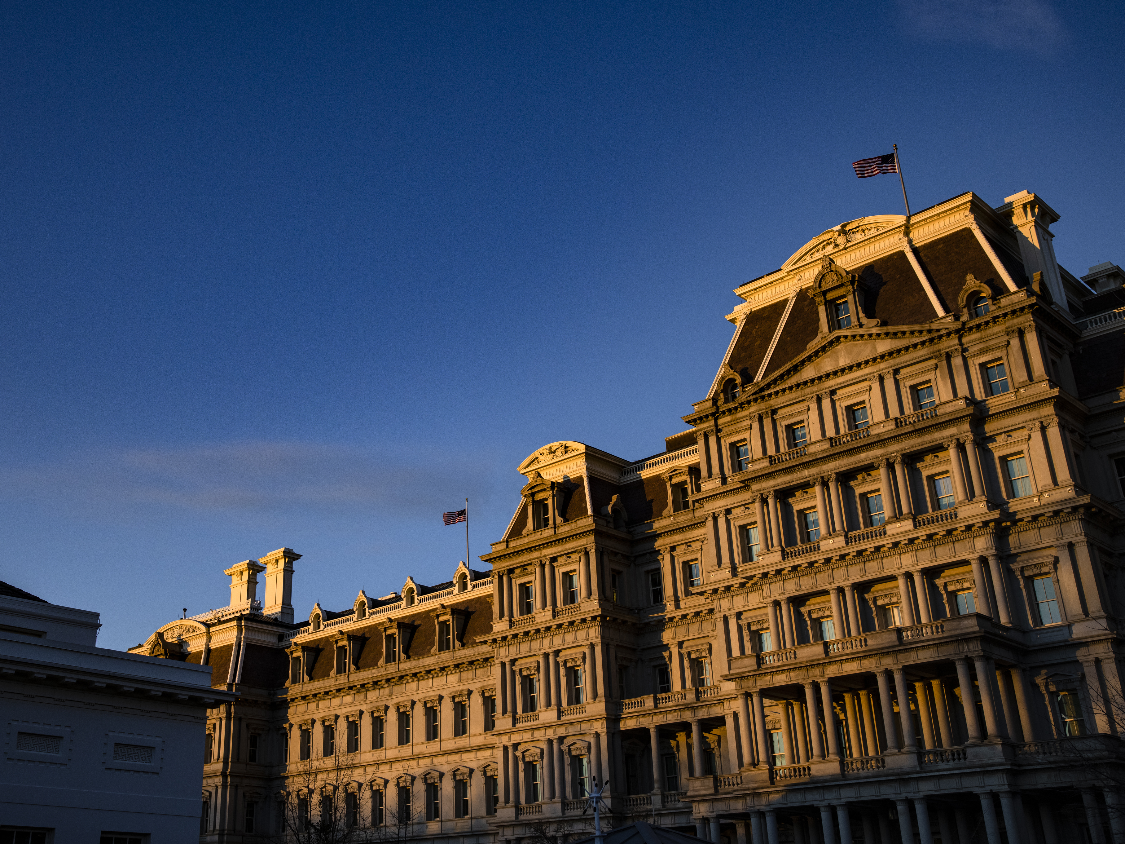 caption: The White House team of lawyers, strategists and veterans of Capitol Hill meets regularly in the Secretary of War suite inside the Eisenhower Executive Office Building.