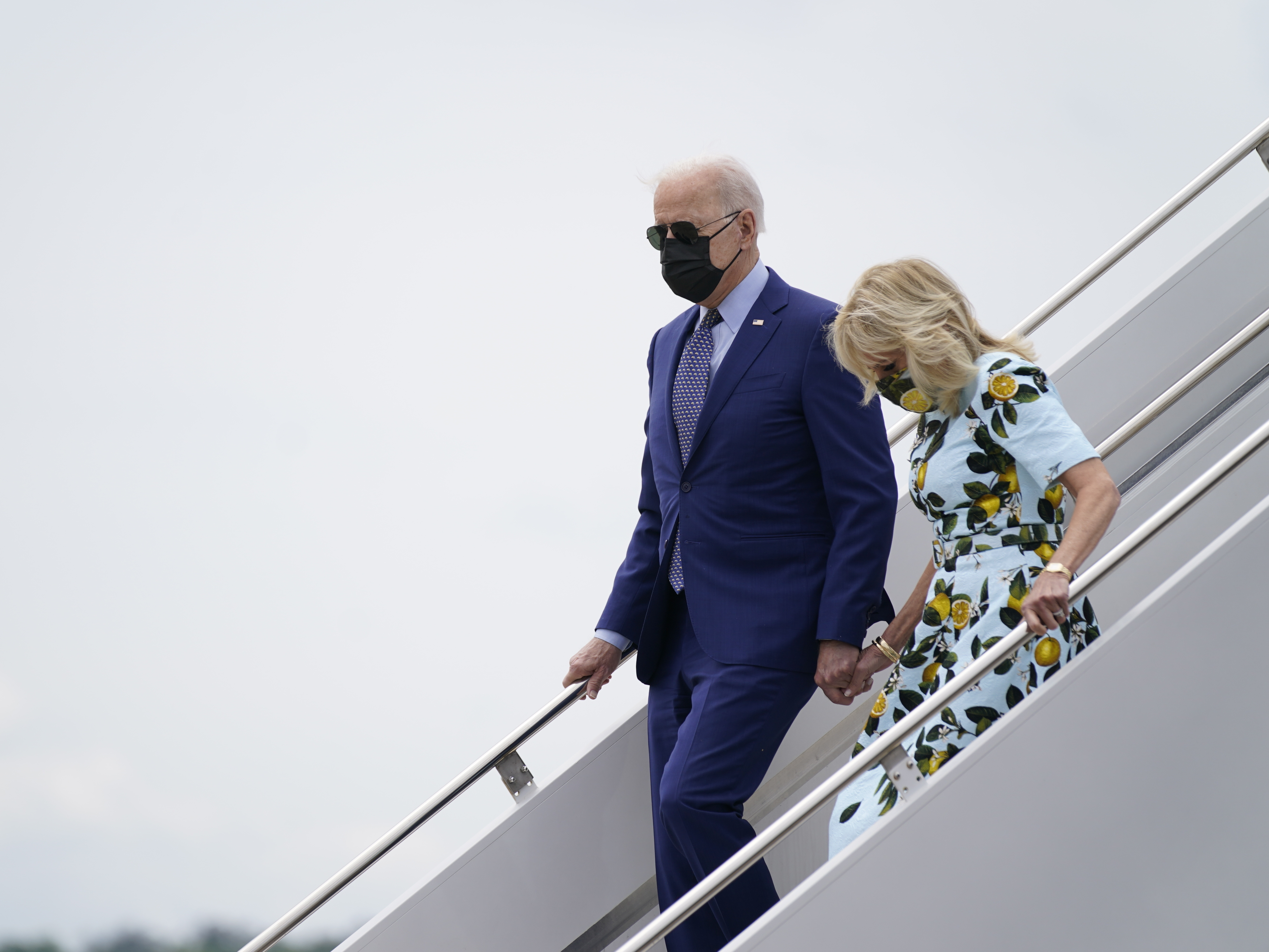 caption: President Biden and first lady Jill Biden arrive Thursday at Fort Benning's Lawson Army Airfield in Georgia. Biden met with former President Jimmy Carter in Plains, Ga., ahead of a drive-in rally near Atlanta.