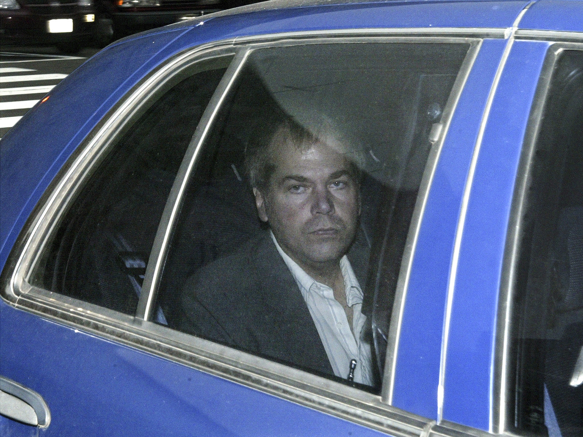 caption: In this Nov. 18, 2003, file photo, John Hinckley Jr. arrives at U.S. District Court in Washington.
