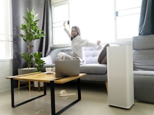 caption: Poor indoor air quality can contribute to health problems. Letting in fresh air, keeping air filters changed and using air purifiers can help.