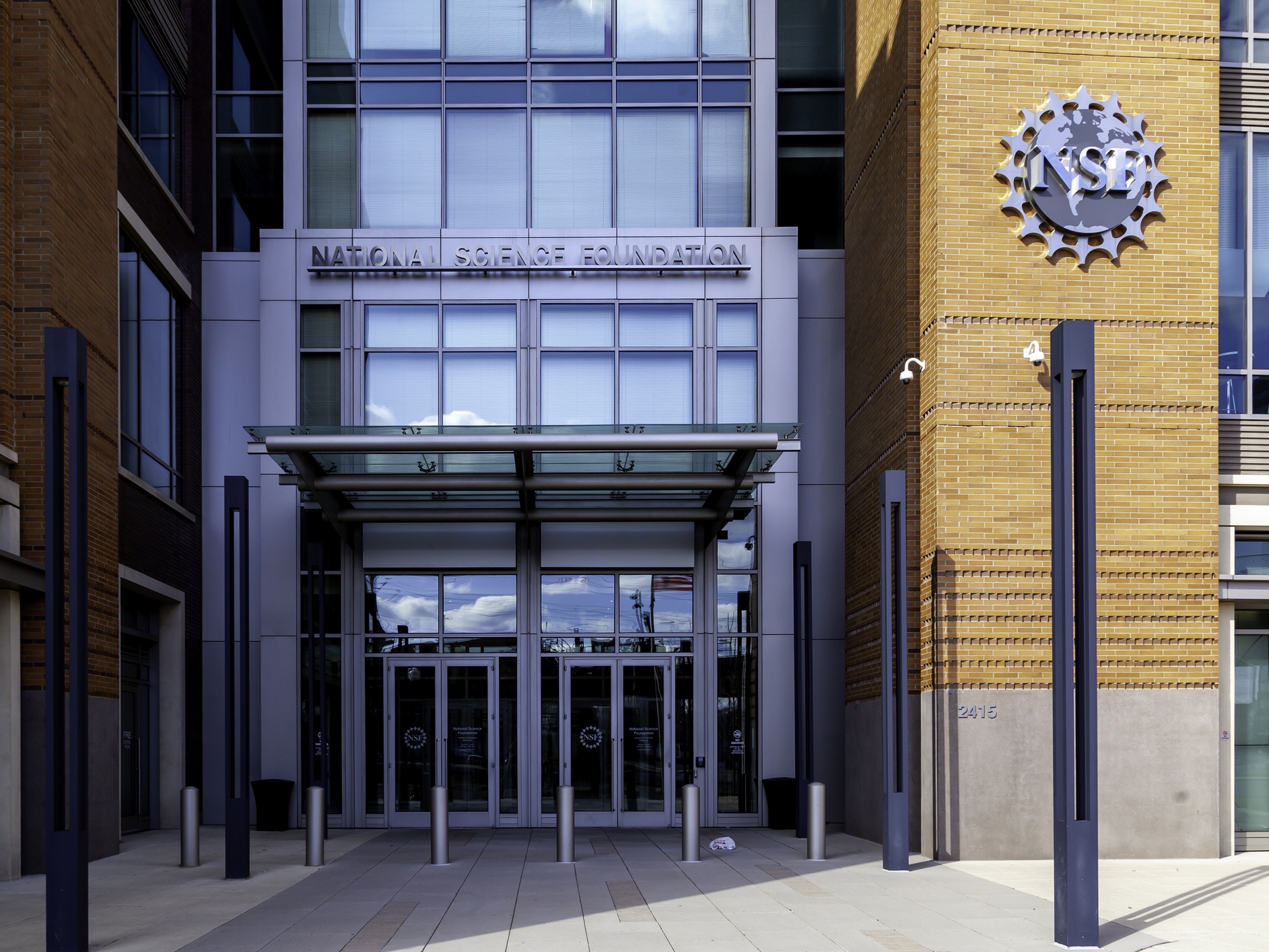 caption: Washington D.C., USA - February 29, 2020: Entrance of The National Science Foundation (NSF) in Washington D.C., USA. NSF is a United States government agency.