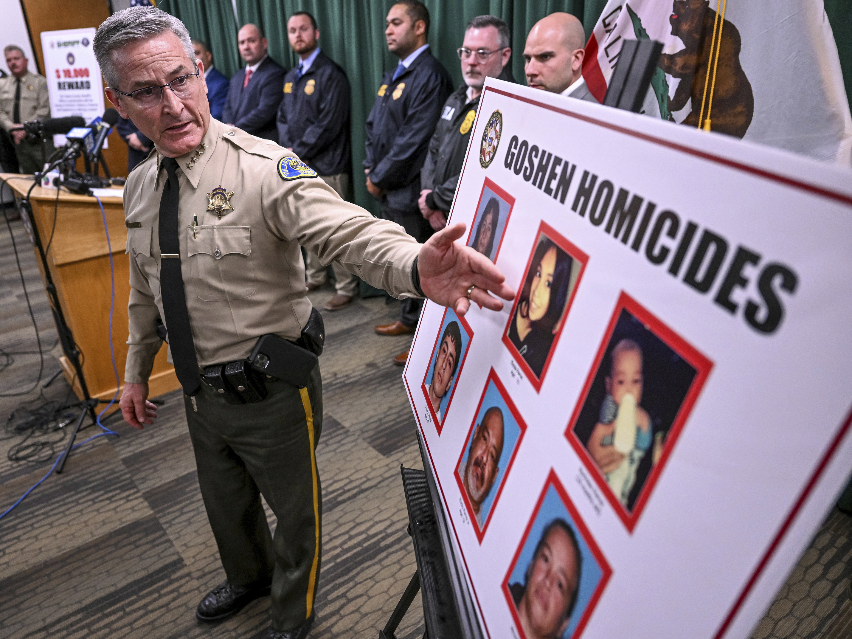 caption: Tulare County Sheriff Mike Boudreaux speaks during a news conference on Tuesday, in Visalia, Calif., about the victims from a shooting the before that left six people dead in Goshen.