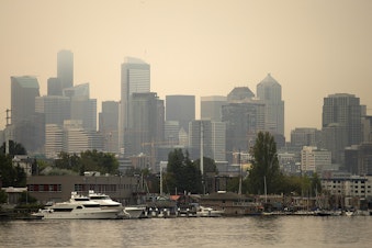 caption: A smoky Seattle skyline is shown from N. Northlake Way on Tuesday, September 5, 2017.