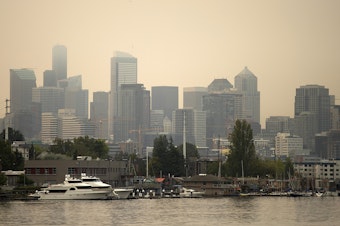 caption: A smoky Seattle skyline is shown from N. Northlake Way on Tuesday, September 5, 2017.
