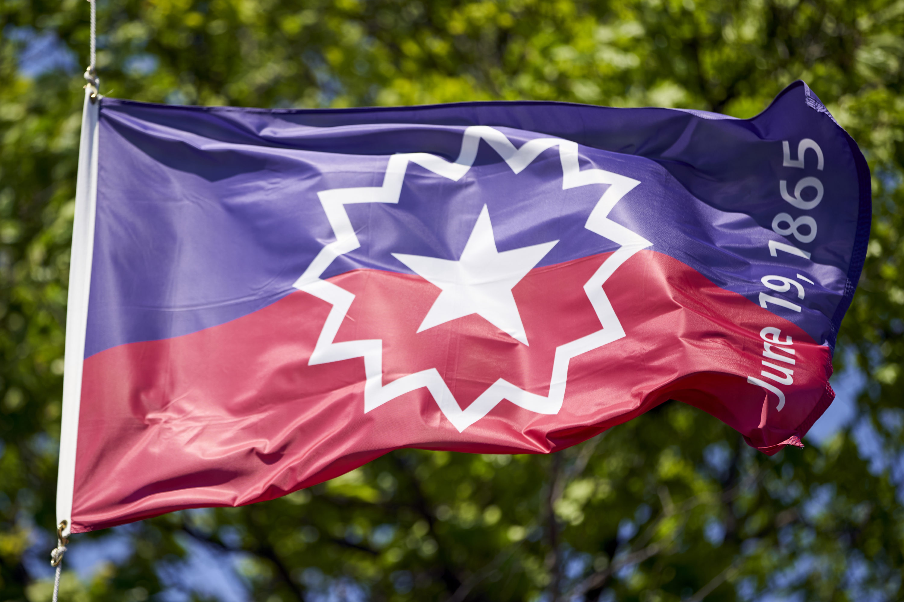 caption: The Juneteenth flag, commemorating the day that slavery ended in the U.S., flies in Omaha, Neb., Wednesday, June 17, 2020. (Nati Harnik/AP Photo)
