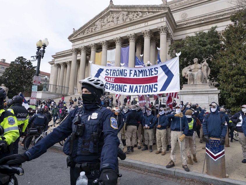 caption: Members of the white supremacist group Patriot Front were seen marching near the National Archives in Washington, D.C., in January.