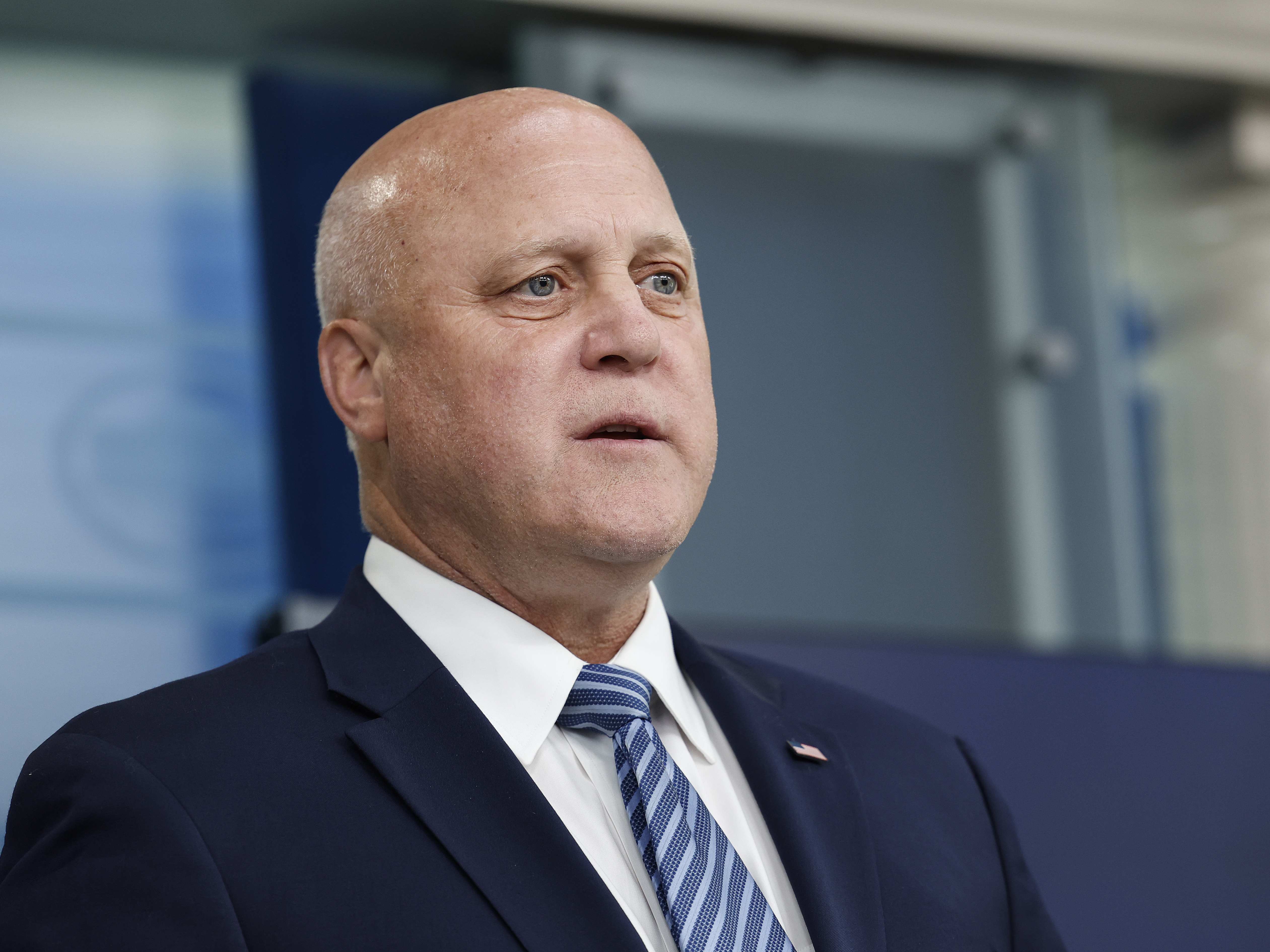 caption: Mitch Landrieu, speaking at the White House in May, is President Biden's point man on infrastructure.
