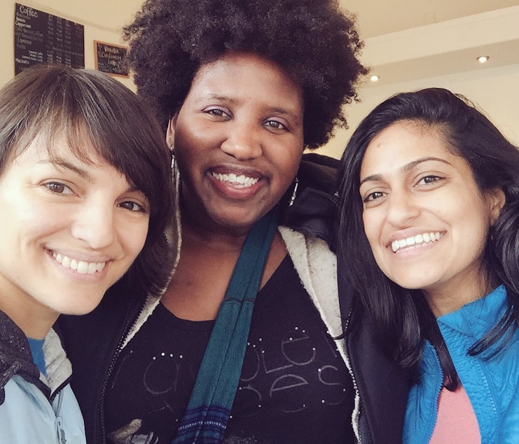 caption: Monica Guzman (left), co-founder of Seattle newsletter The Evergrey, and Reagan Jackson (center) writer at The Seattle Globalist and South Seattle Emerald. Pictured with Anika Anand, Guzman's co-founder at The Evergrey. (via Twitter)