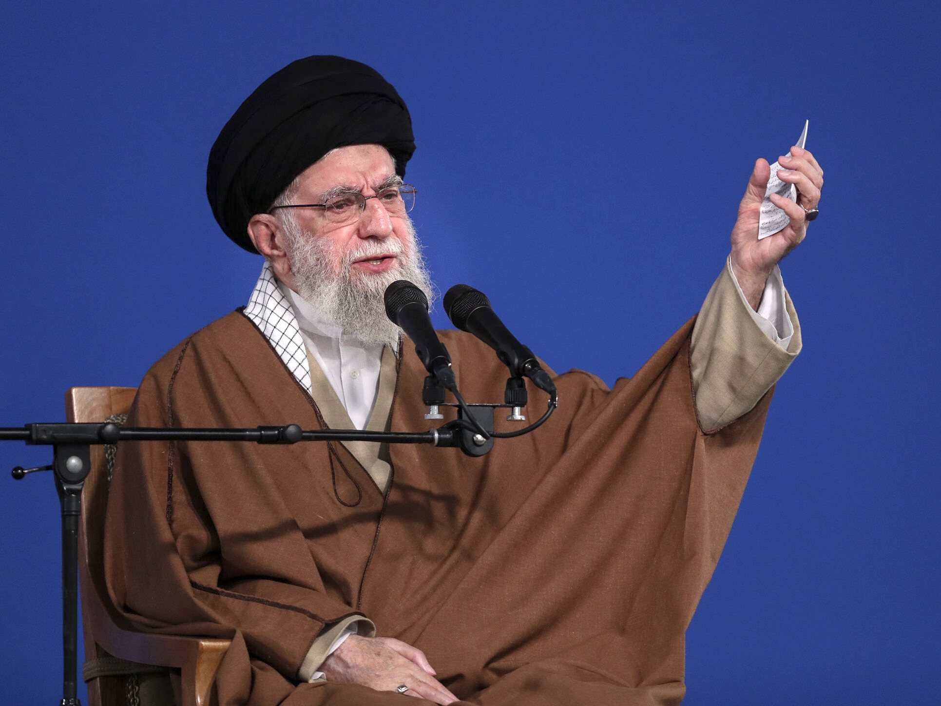 caption: In this photo released by the official website of the office of the Iranian supreme leader, Supreme Leader Ayatollah Ali Khamenei speaks to a group of people and officials in Tehran, Iran, Friday, March 21, 2025.