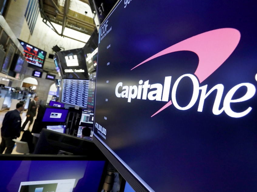 caption: Capital One has become the nation's largest bank to end overdraft fees for all of its customers. Federal regulators are taking a hard look at bank overdraft fees, which hit customers with lower incomes the hardest.