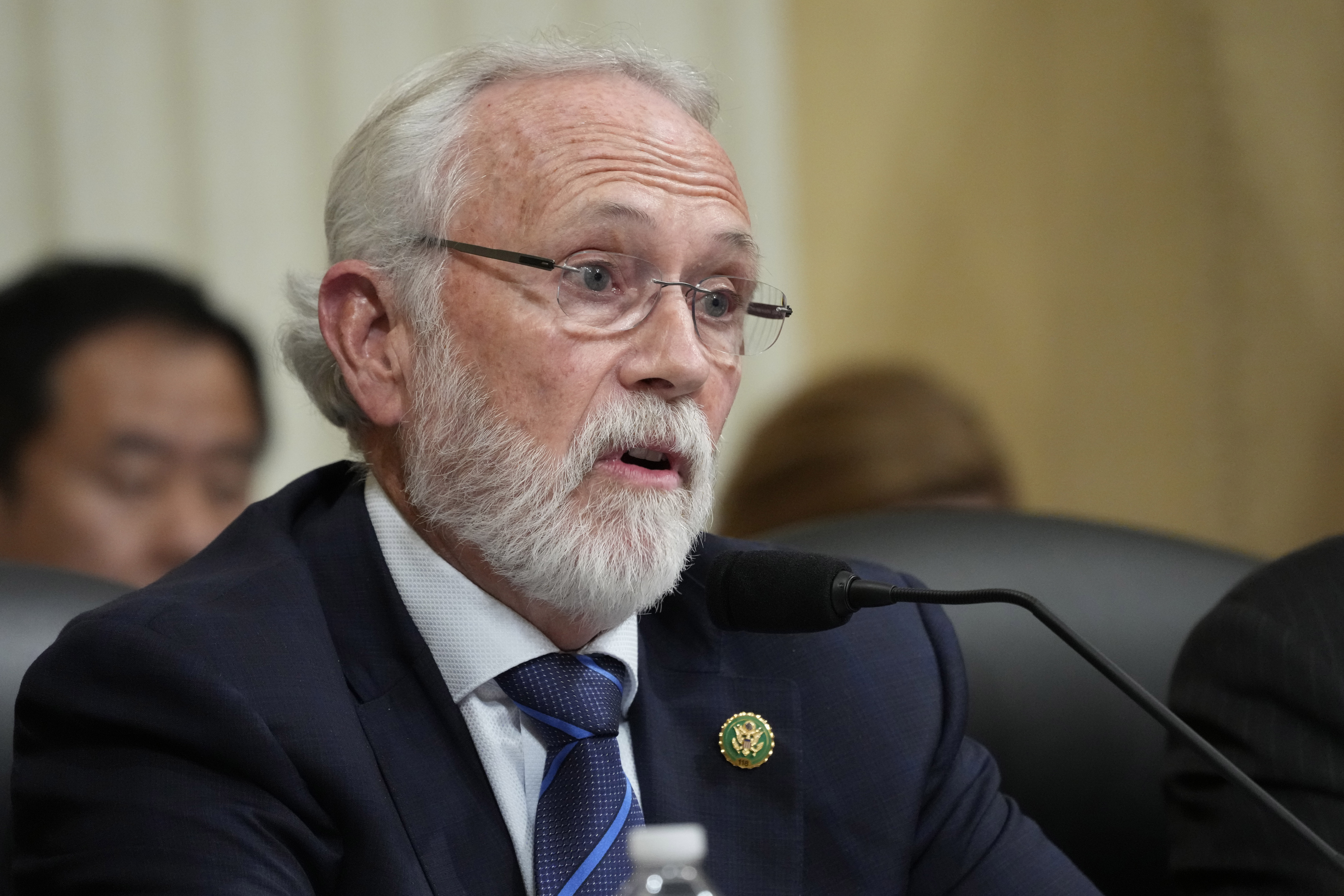 caption: FILE - Rep. Dan Newhouse, R-Wash., questions witnesses during a hearing of a special House committee dedicated to countering China, on Capitol Hill, Feb. 28, 2023, in Washington.