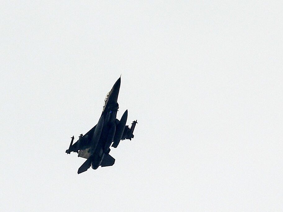 caption: This picture, taken a position in northern Israel, shows an Israeli Air Force fighter jet flying over the border area with southern Lebanon on March 13, 2026.