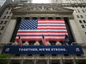 caption: Stocks fell sharply Thursday after the Federal Reserve warned that the recovery will take a long time.