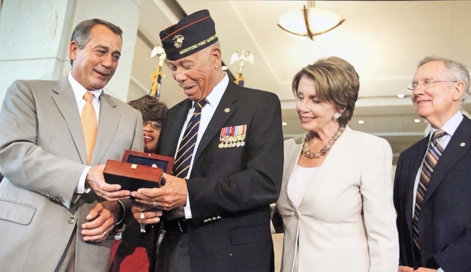 caption: First Sgt. William "Jack" McDowell receives a Congressional Gold Medal for his service as a Montford Point Marine. (Courtesy of William "Jack" McDowell)