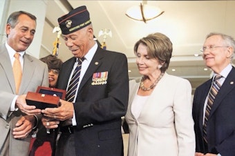 caption: First Sgt. William "Jack" McDowell receives a Congressional Gold Medal for his service as a Montford Point Marine. (Courtesy of William "Jack" McDowell)