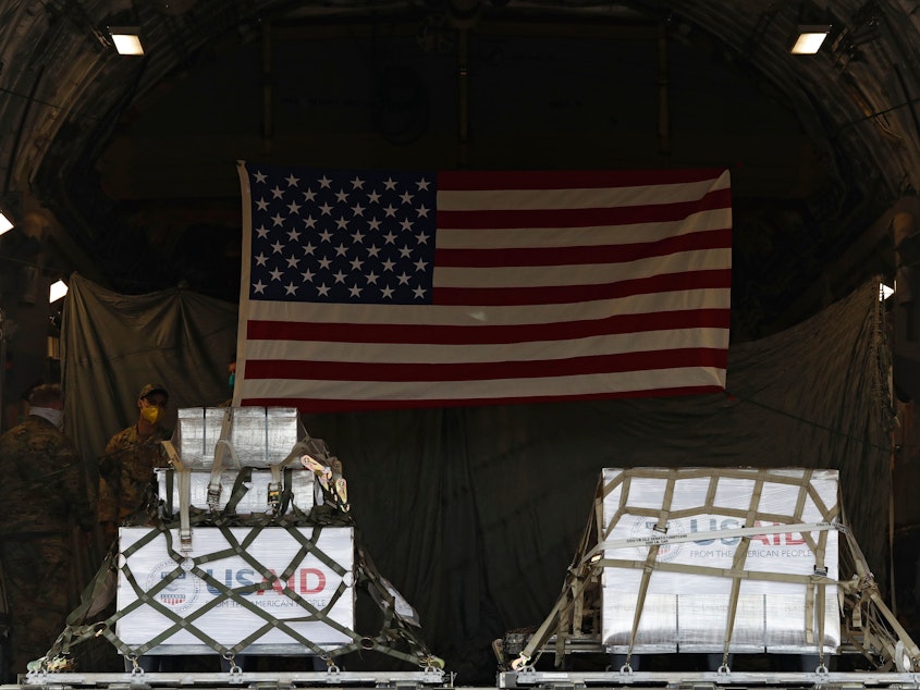 caption: A shipment of medical aid from the United States, including 50 ventilators, appears inside a U.S. Air Force C-17 Globemaster transport plane Thursday at Vnukovo International Airport outside Moscow.