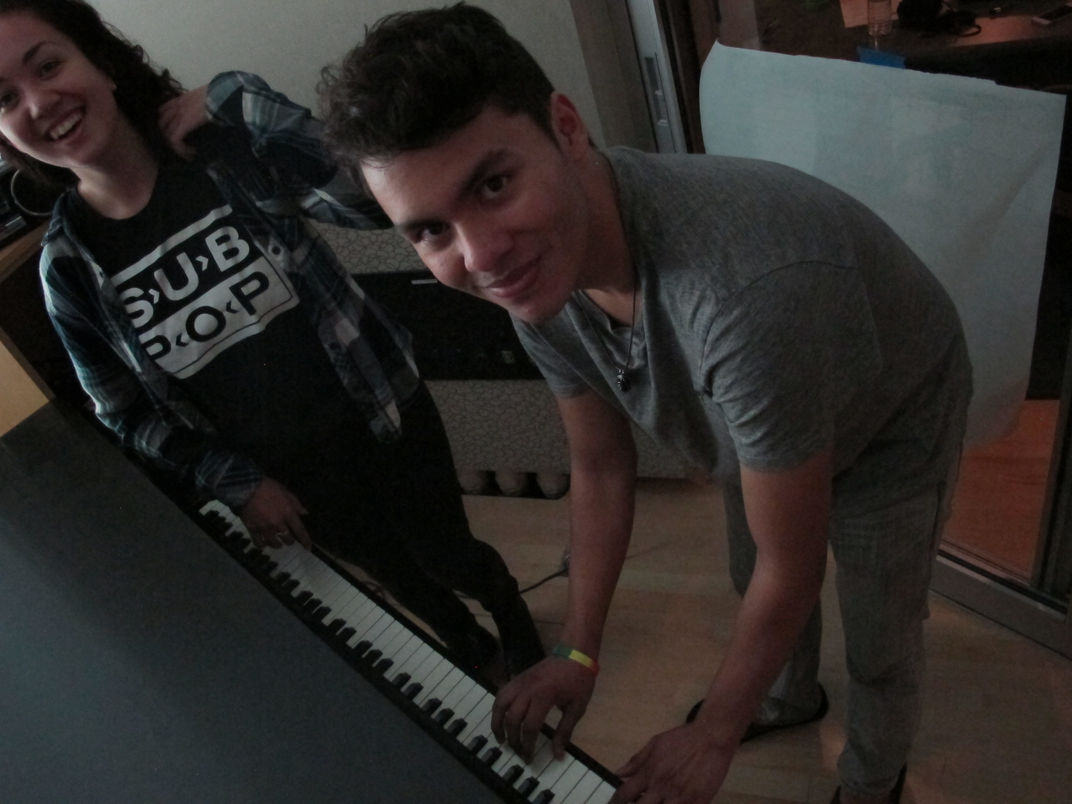 caption: RadioActive Producers Noah Phillips-Reardon (L) and Ernesto Morfin celebrate finishing this podcast!