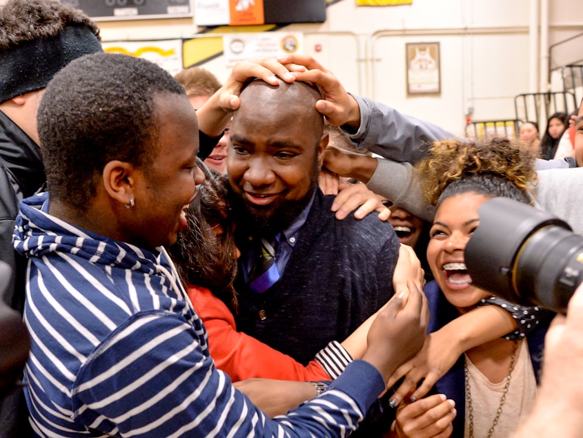caption: Ecstatic students swarmed Nathan Gibbs-Bowling seconds after he heard Senator Patty Murray announce that he is the 2013–14 Milken Educator Award winner for the state of Washington.