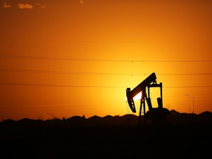 caption: Oil prices are down amid weak demand and investors no longer seem willing to write the industry a blank check.