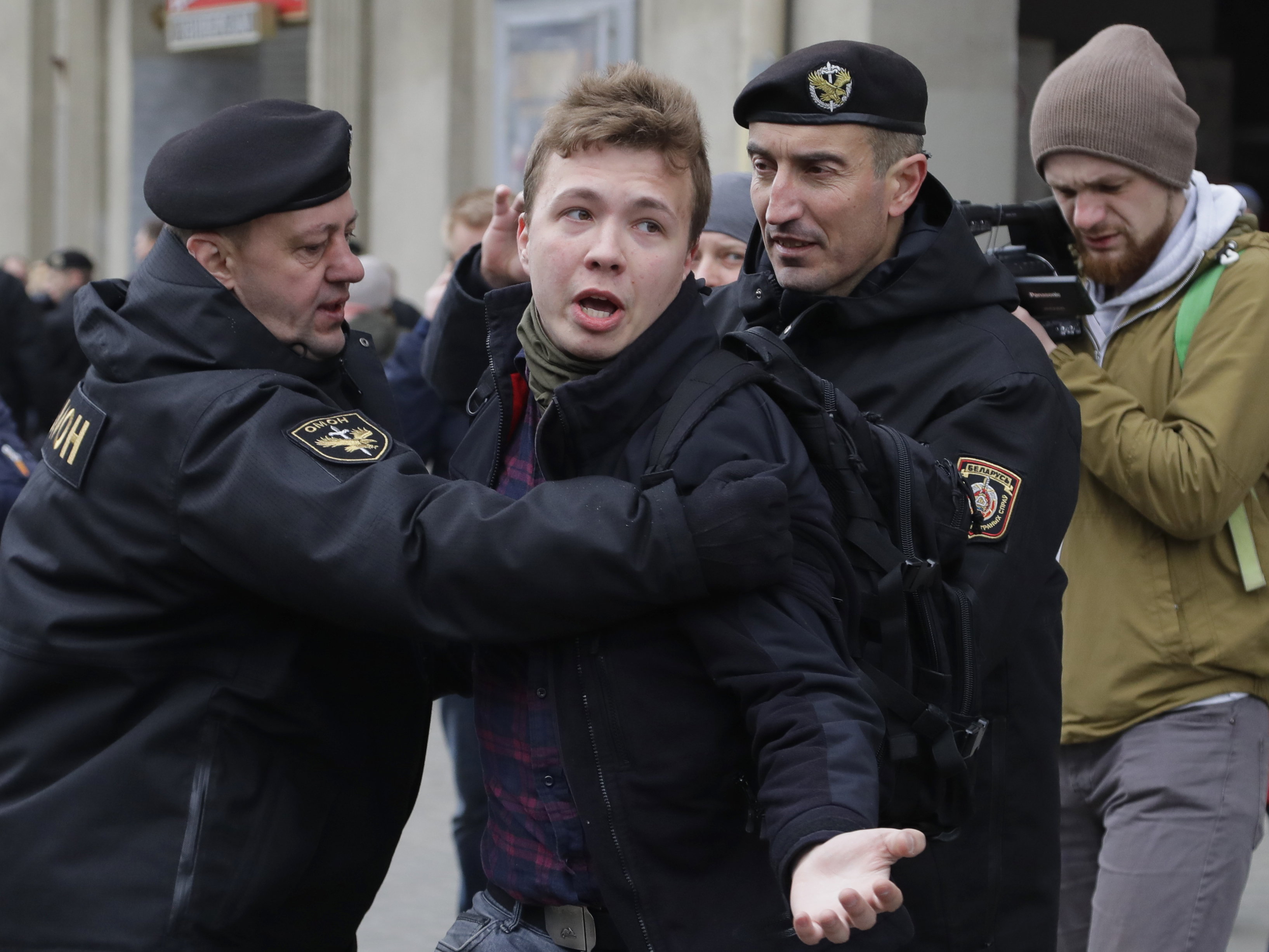 caption: Belarus police detain journalist Roman Protasevich center, in Minsk, Belarus March 26, 2017. Protasevich was arrested after an airliner in which he was riding was diverted to Belarus.