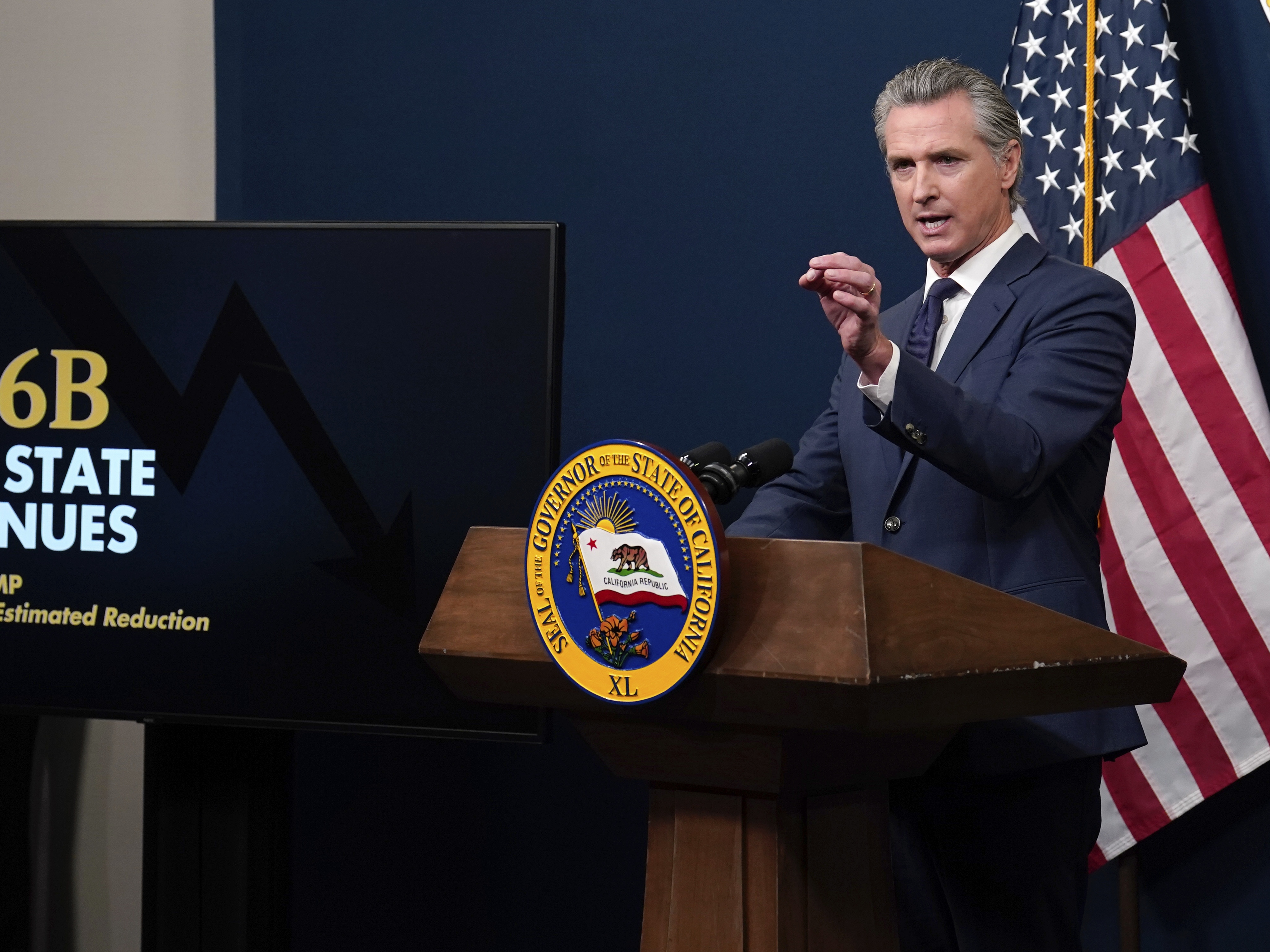 caption: Calif. Gov. Gavin Newsom presents his revised 2025-2026 state budget during a news conference in Sacramento, Calif., Wednesday, May 14, 2025.
