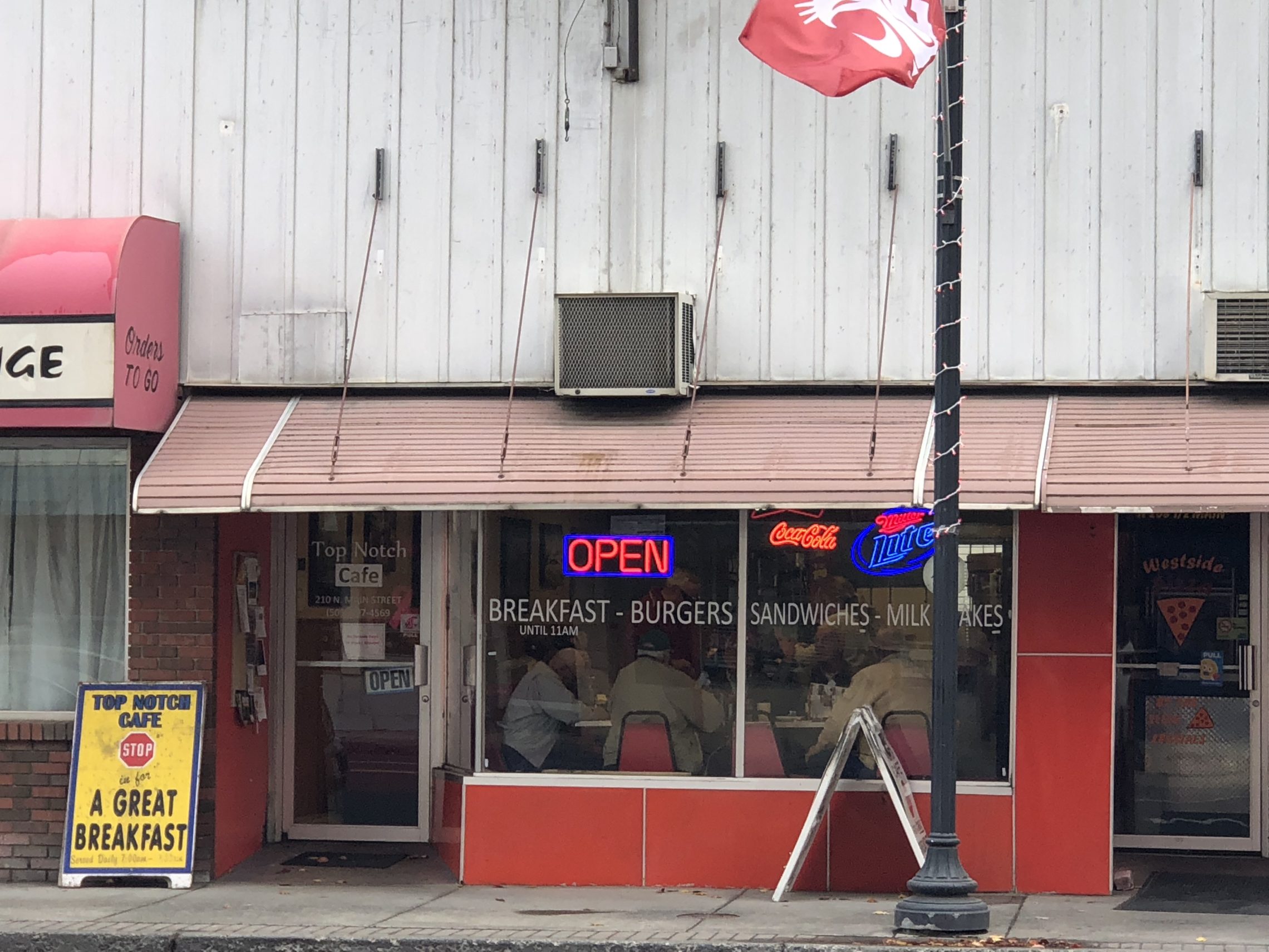 caption: The Top Notch Cafe in Colfax is the site of good food and plenty of political discussion from the regular group of retired farmers on Nov. 6, 2018. CREDIT: ANNA KING/N3