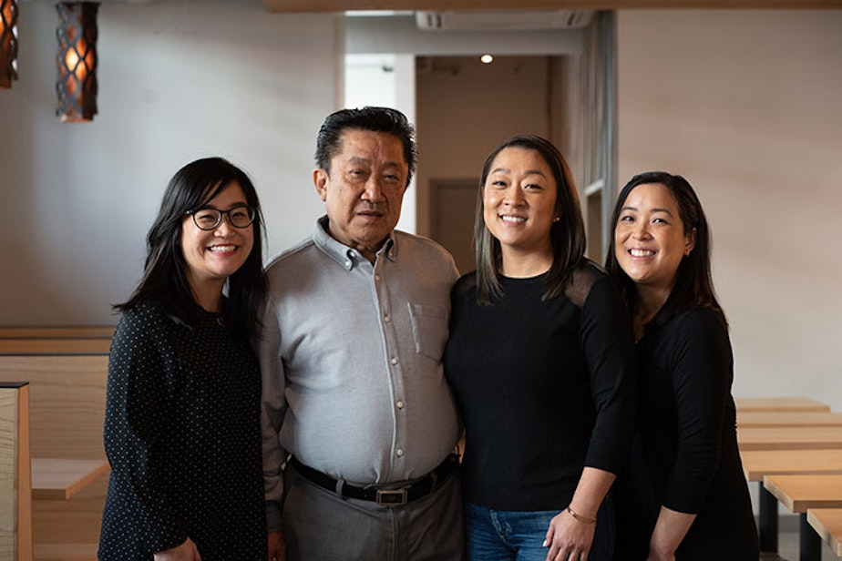 caption: The family who owns Phnom Penh Noodle House in Seattle's Little Saigon Neighborhood pose for a portrait. From left to right: Diane Le, Sam Ung, Dawn Ung, and Darlene Ung.