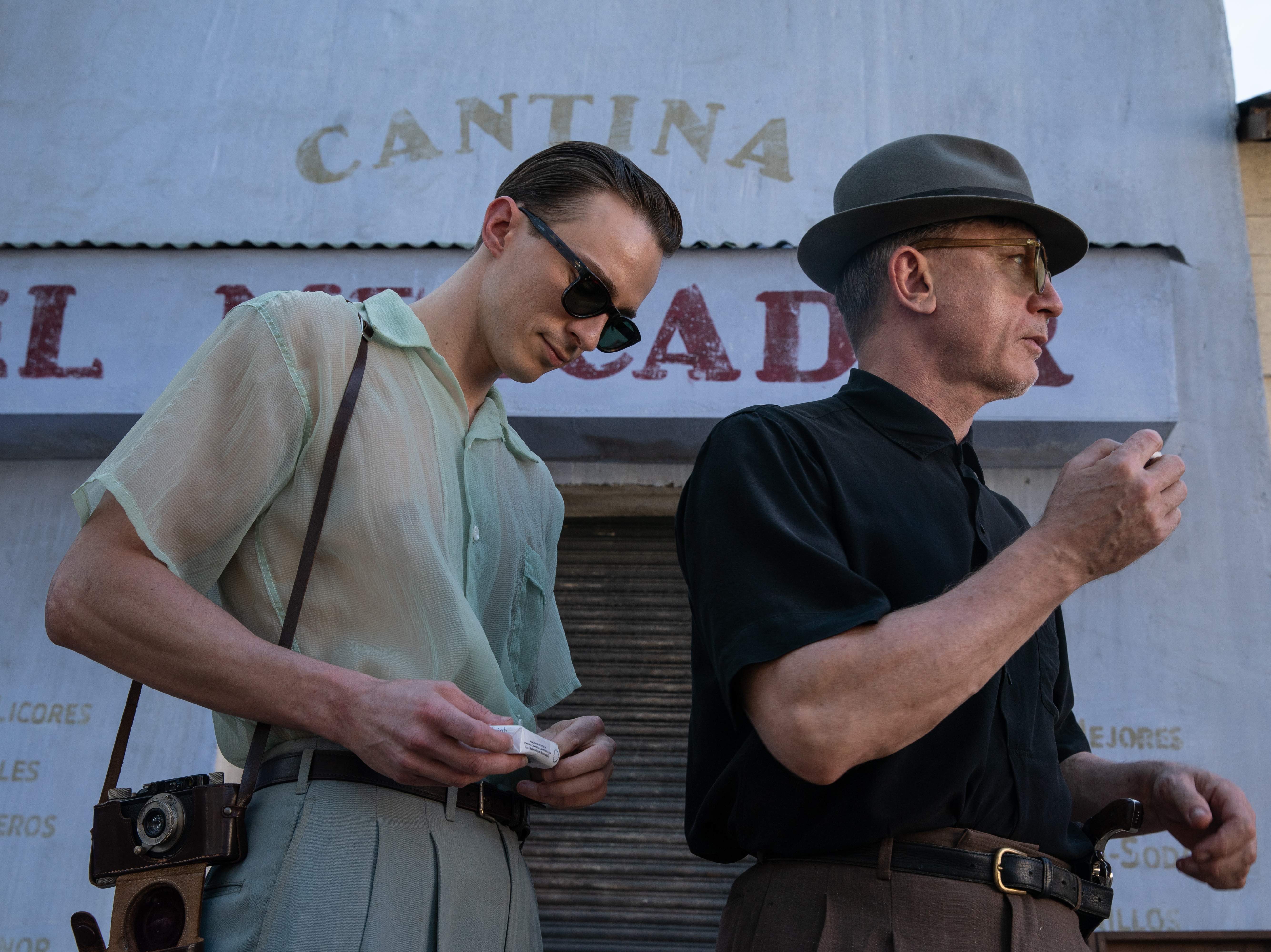 caption: William Lee (Daniel Craig, right) falls for a freshly discharged U.S. Navy serviceman (Drew Starkey) in <em>Queer</em>.