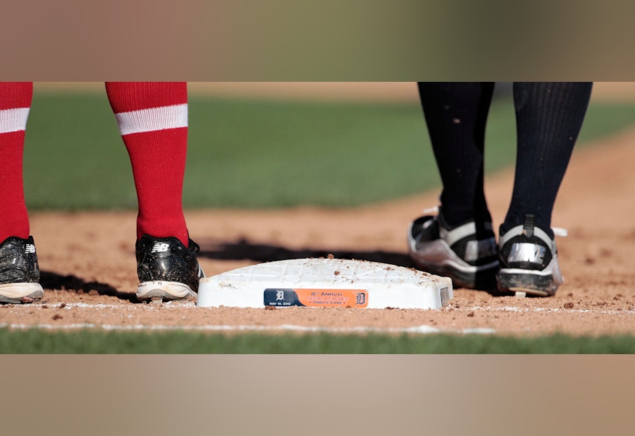 caption: A detailed view of first base celebrating the 18th Annual Negro League Tribute Game between the Pittsburgh Pirates and the Detroit Tigers at Comerica Park on in Detroit, Michigan. The Pirates defeated the Tigers 4-3.