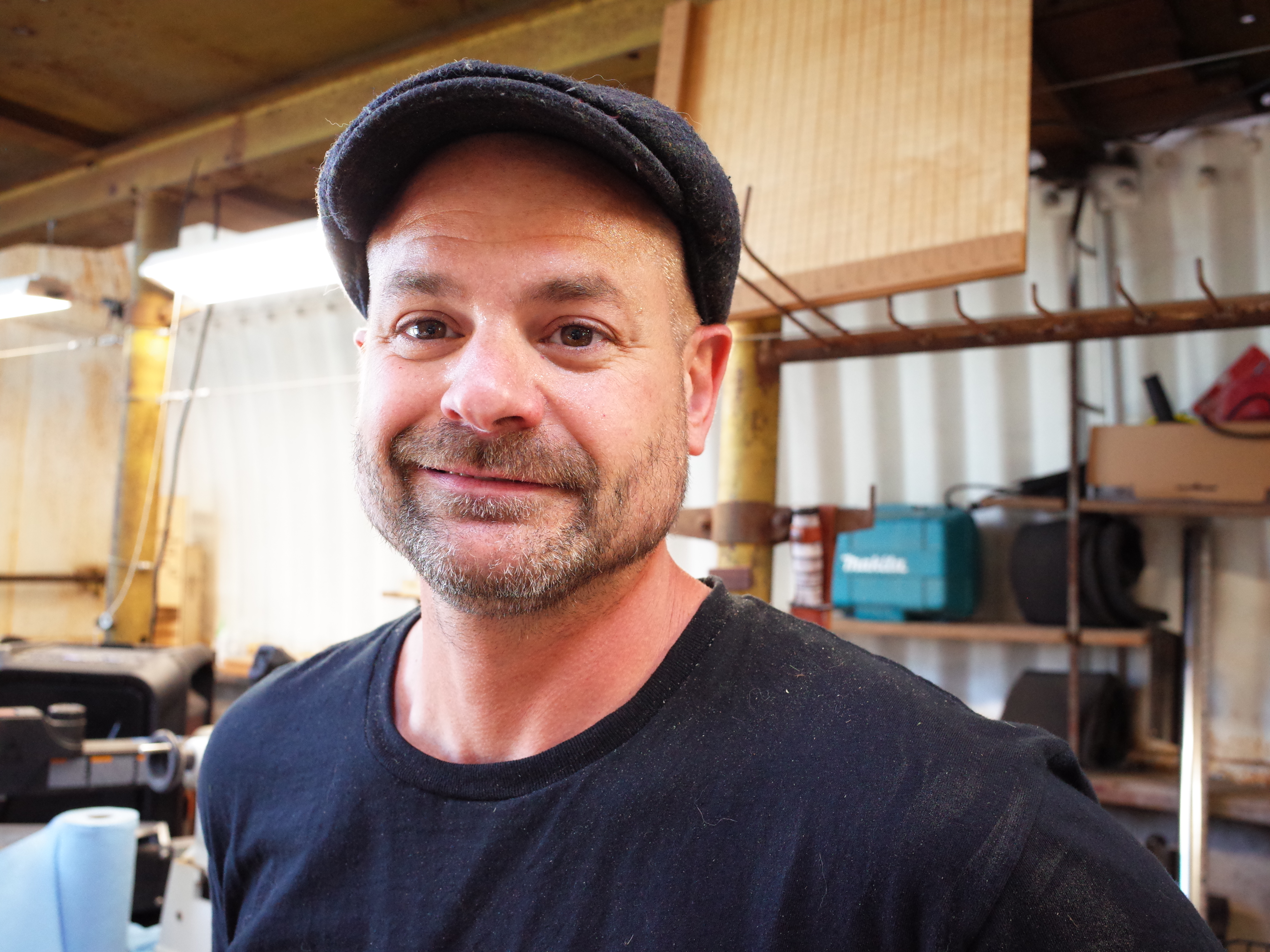 caption: Dan Schiaffo's business card reads 'Laser Craftsman.' Tap/click on the image for more photos. 