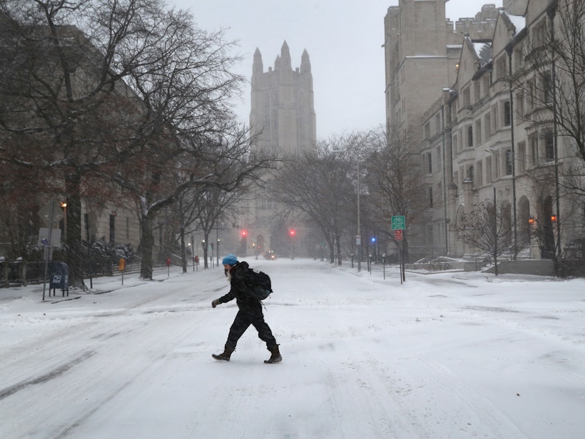 caption: Yale University in New Haven, Conn. — pictured during a snowstorm in Jan. 2018 — is no longer facing a federal discrimination lawsuit after the Department of Justice withdrew it on Feb. 3.