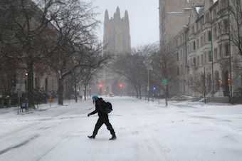 caption: Yale University in New Haven, Conn. — pictured during a snowstorm in Jan. 2018 — is no longer facing a federal discrimination lawsuit after the Department of Justice withdrew it on Feb. 3.