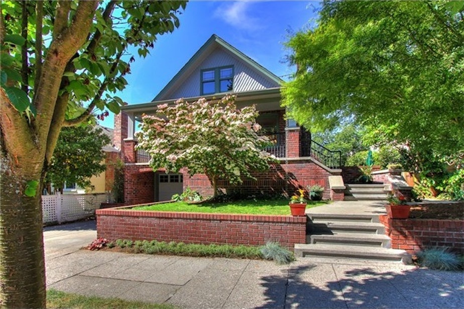 caption: Demand is soaring for Seattle-area homes. Buyers who want to succeed are bidding up prices. This Seattle house recently sold for $100,000 over the asking price. 