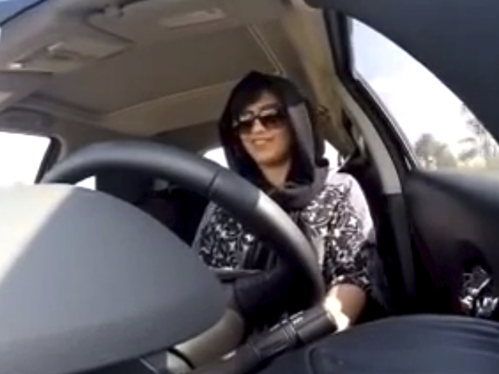 caption: This Nov. 30, 2014 image made from video released by Loujain al-Hathloul shows her driving toward the United Arab Emirates-Saudi Arabia border before her arrest on Dec. 1, 2014, in Saudi Arabia. Al-Hathloul has been imprisoned for over two years and will be tried by a court established to oversee terrorism cases, her family said Wednesday.