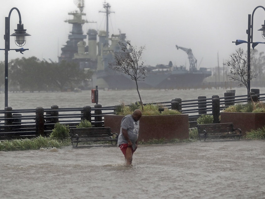 caption: Downtown Wilmington, N.C., after Hurricane Florence made landfall in 2018. Storms like Florence, with both heavy rain and very high tides, are projected to get more common as the Earth gets hotter.