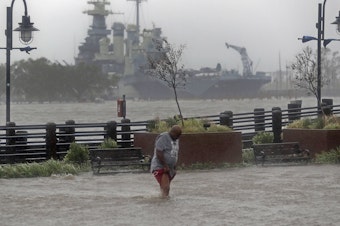 caption: Downtown Wilmington, N.C., after Hurricane Florence made landfall in 2018. Storms like Florence, with both heavy rain and very high tides, are projected to get more common as the Earth gets hotter.