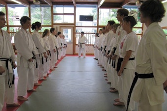 caption: Sensei Joni Sharrah at USA Karate, the dojo she founded in Shoreline.