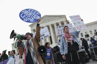 caption: The Supreme Court will hear another case about abortion rights on Wednesday. Protestors gathered outside the court last month when the case before the justices involved abortion pills.