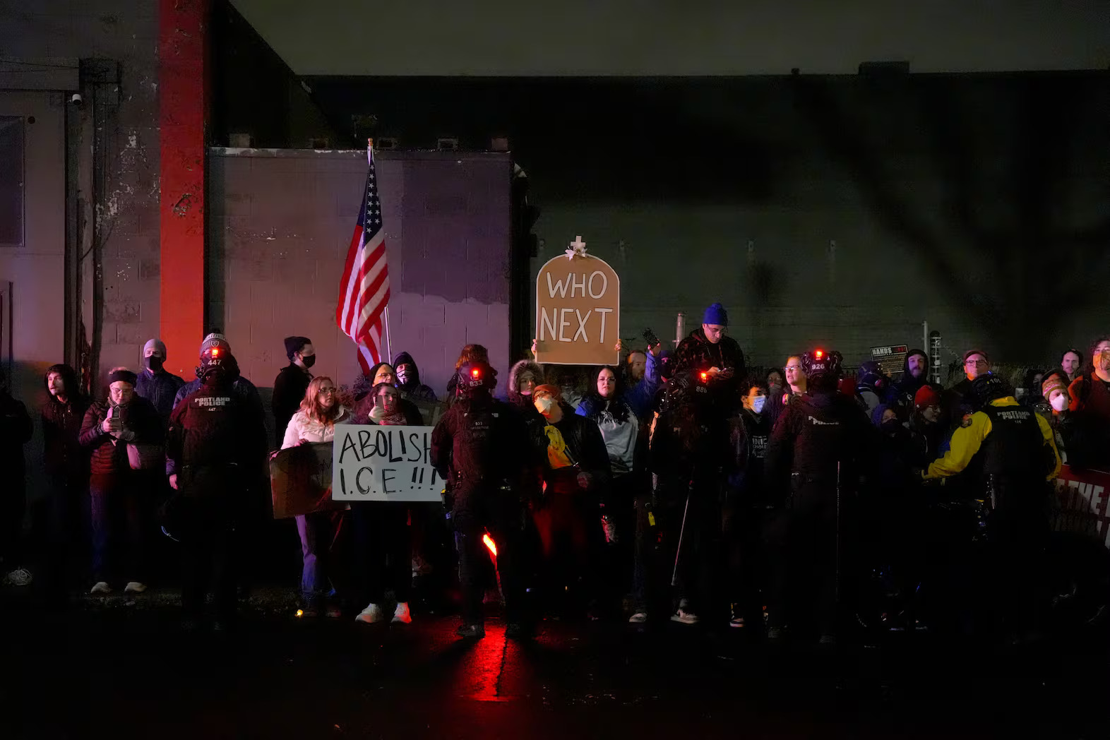 caption: Protesters at the U.S. Immigrations and Customs Enforcement building in Portland, Jan. 8, 2026. Demonstrators gathered outside of the ICE building in protest of the shooting of two people by U.S. Border Patrol in East Portland on Thursday, Jan. 8, 2026.