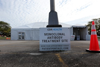 caption: A monoclonal treatment site in Miami is closed on Tuesday after the Food and Drug Administration curbed use of some treatments.