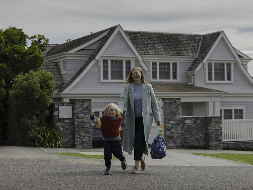 caption: Sarah Snook plays Marissa, a mother desperately trying to locate her 5-year-old son (Duke McCloud), in a new Peacock thriller miniseries adapted from Andrea Mara's novel <em>All Her Fault.</em>