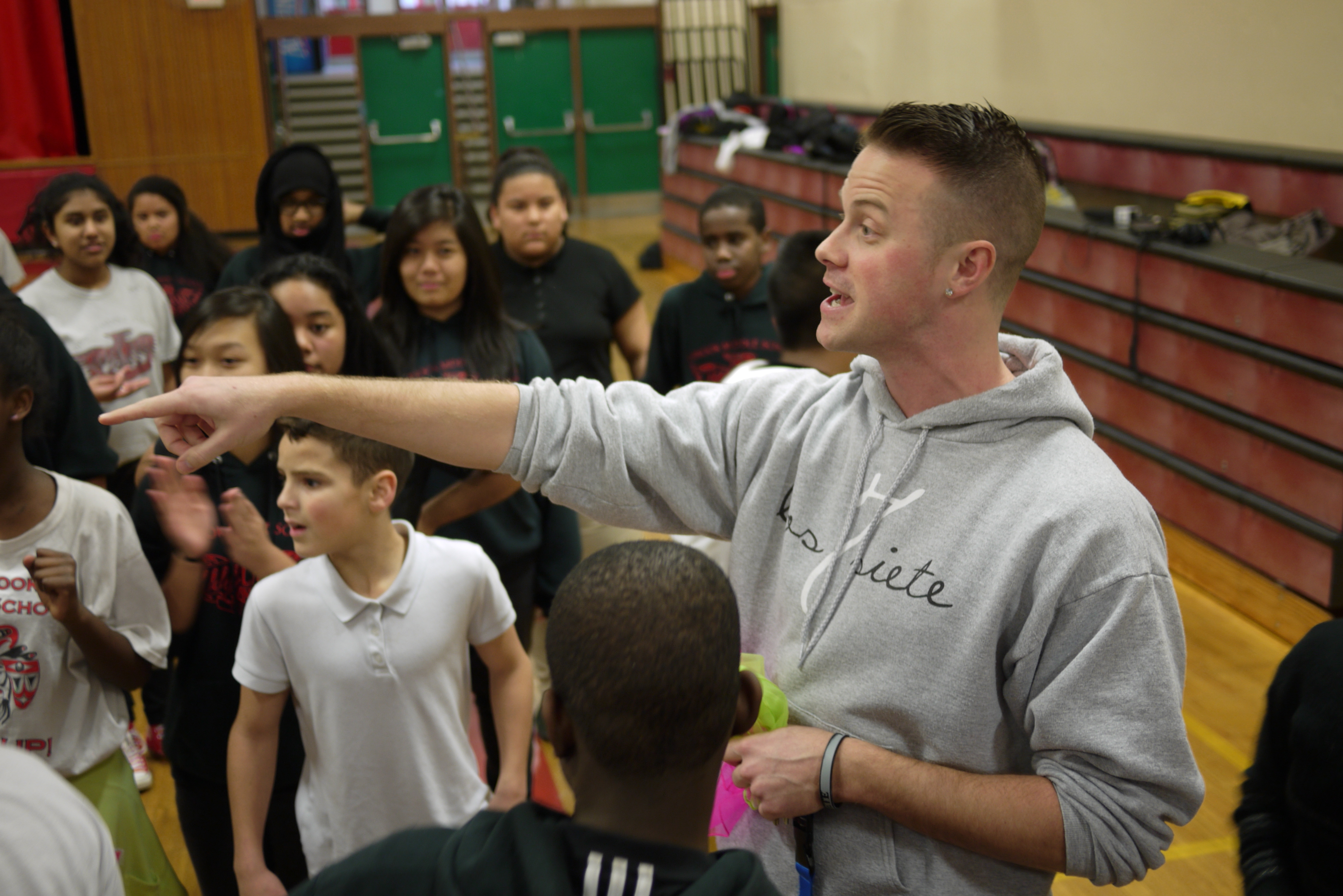 caption: Teacher Reid Sundbad teaches P.E. at Chinook Middle School. He also meets with a group of Latino boys three times a week for a class called Advisory.