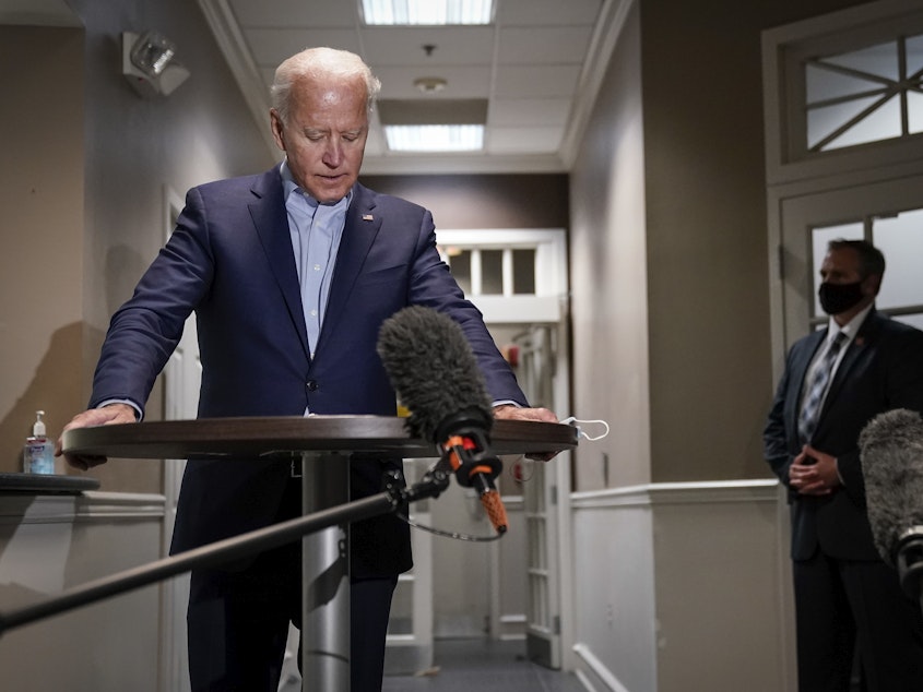 caption: Democratic presidential nominee and former Vice President Joe Biden speaks to reporters about the passing of Supreme Court Justice Ruth Bader Ginsburg upon arrival at New Castle County Airport in Delaware.